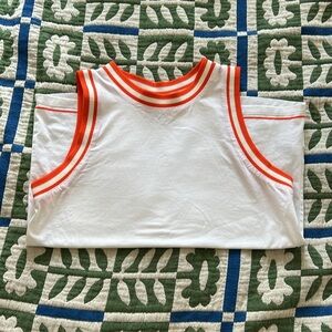 Sleeveless top with orange stripes like new